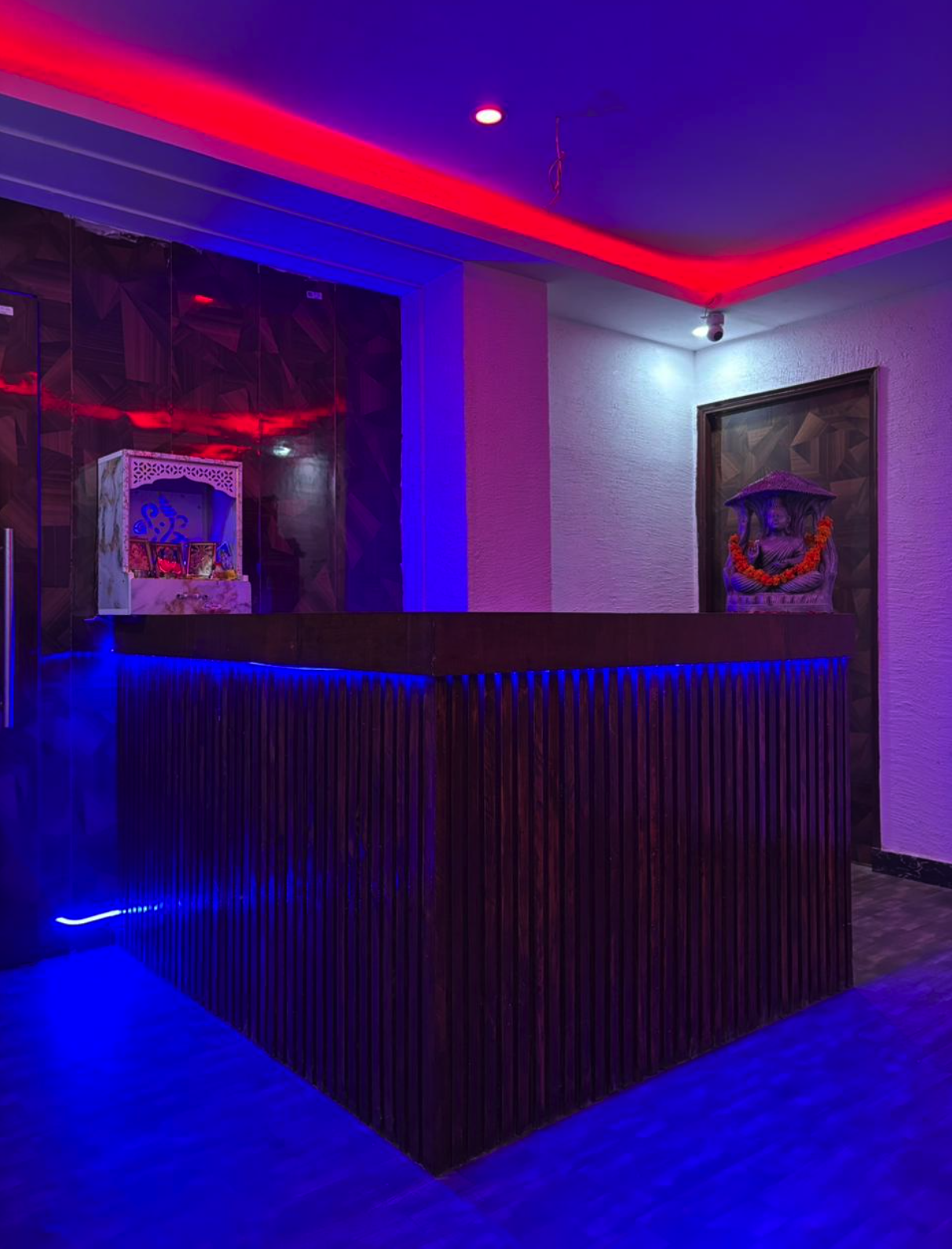 Swargam actual wooden reception lounge desk with blue LED light outlines